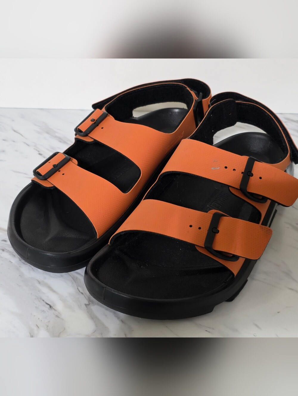 Birkenstock Orange and Black Two-Strap Sandals